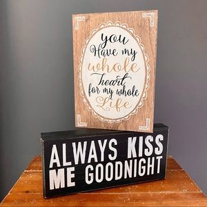 Two Wood Signs With Graphics